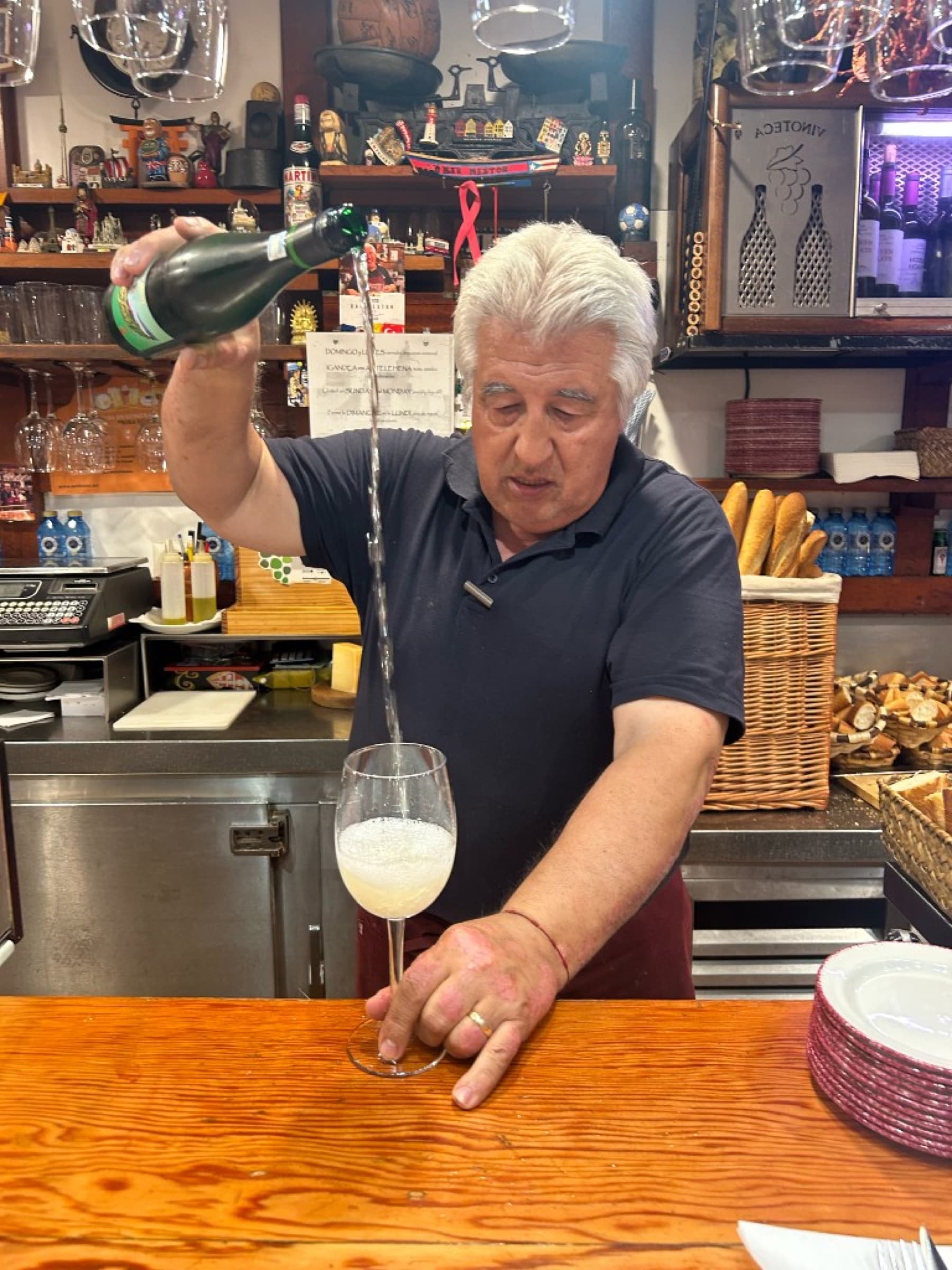 Txakoli poured from height at Bar Nestor