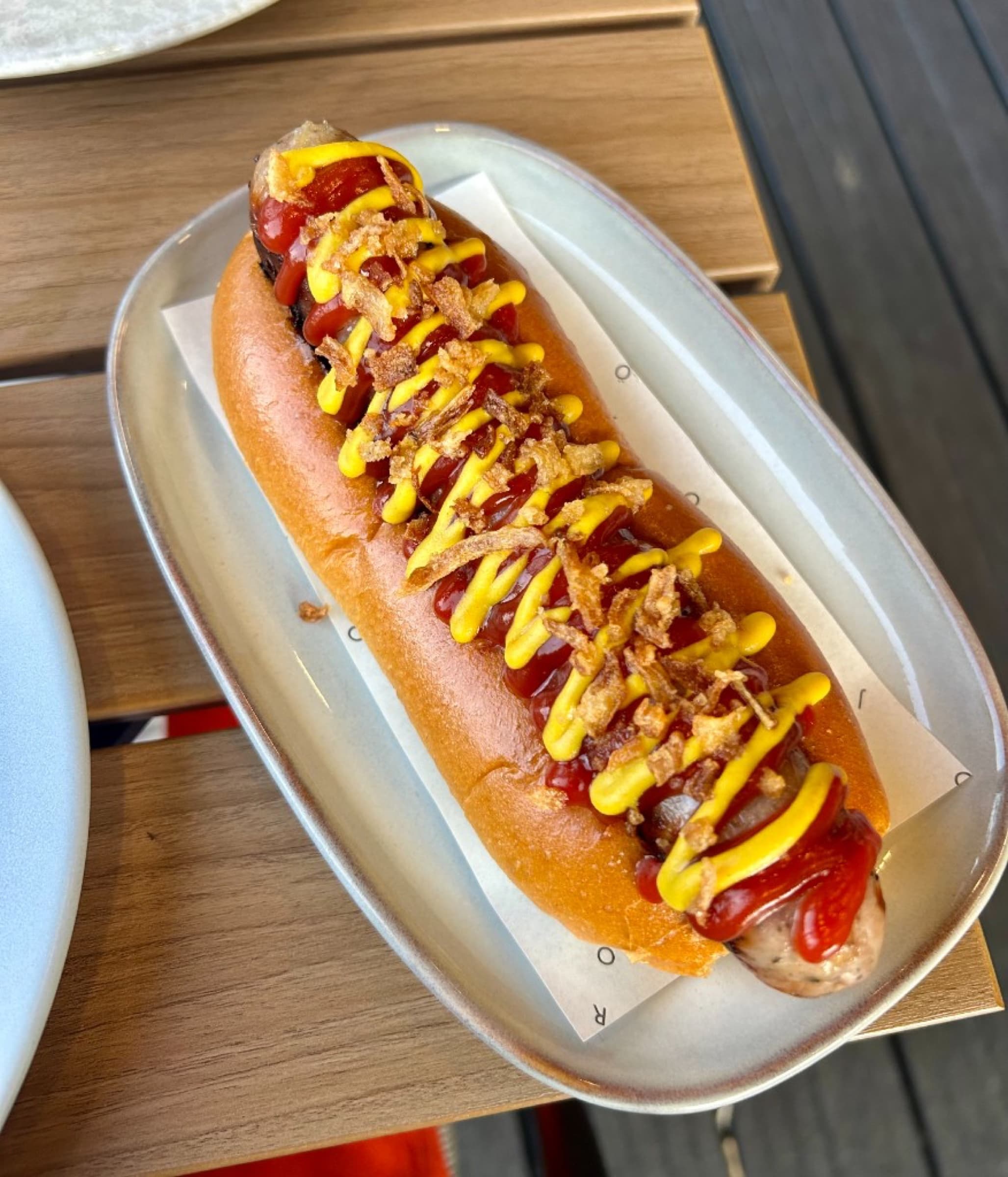 Classic hot dog with Heinz ketchup, French’s mustard, and crispy onions