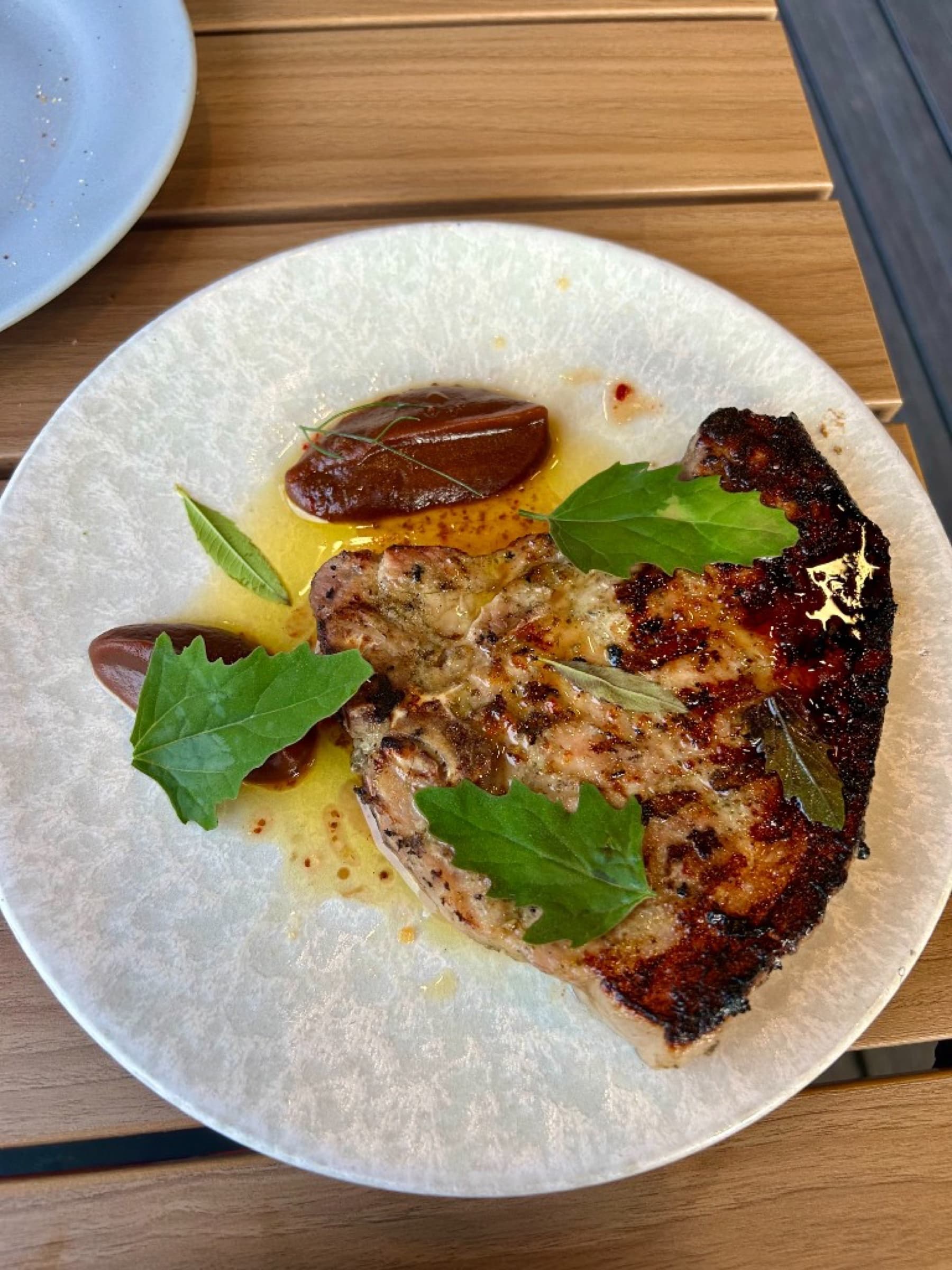 Barbecued woodland pork chop with Braeburn apple barbecue sauce