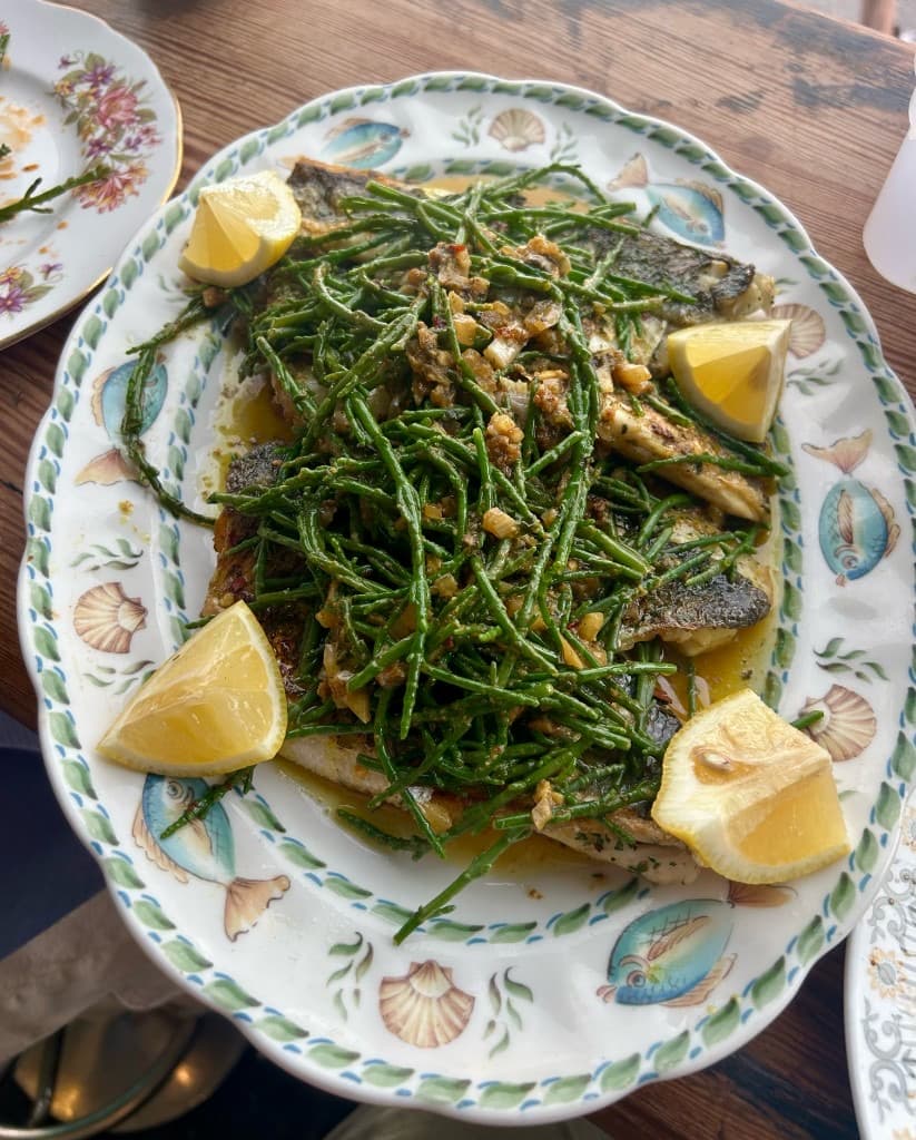 Pan-fried seabass in Café de Paris sauce, with samphire