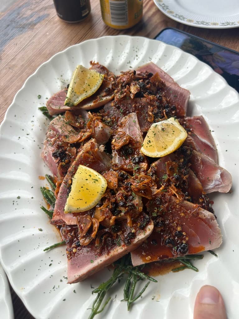 Seared pink tuna steak with chilli oil and samphire