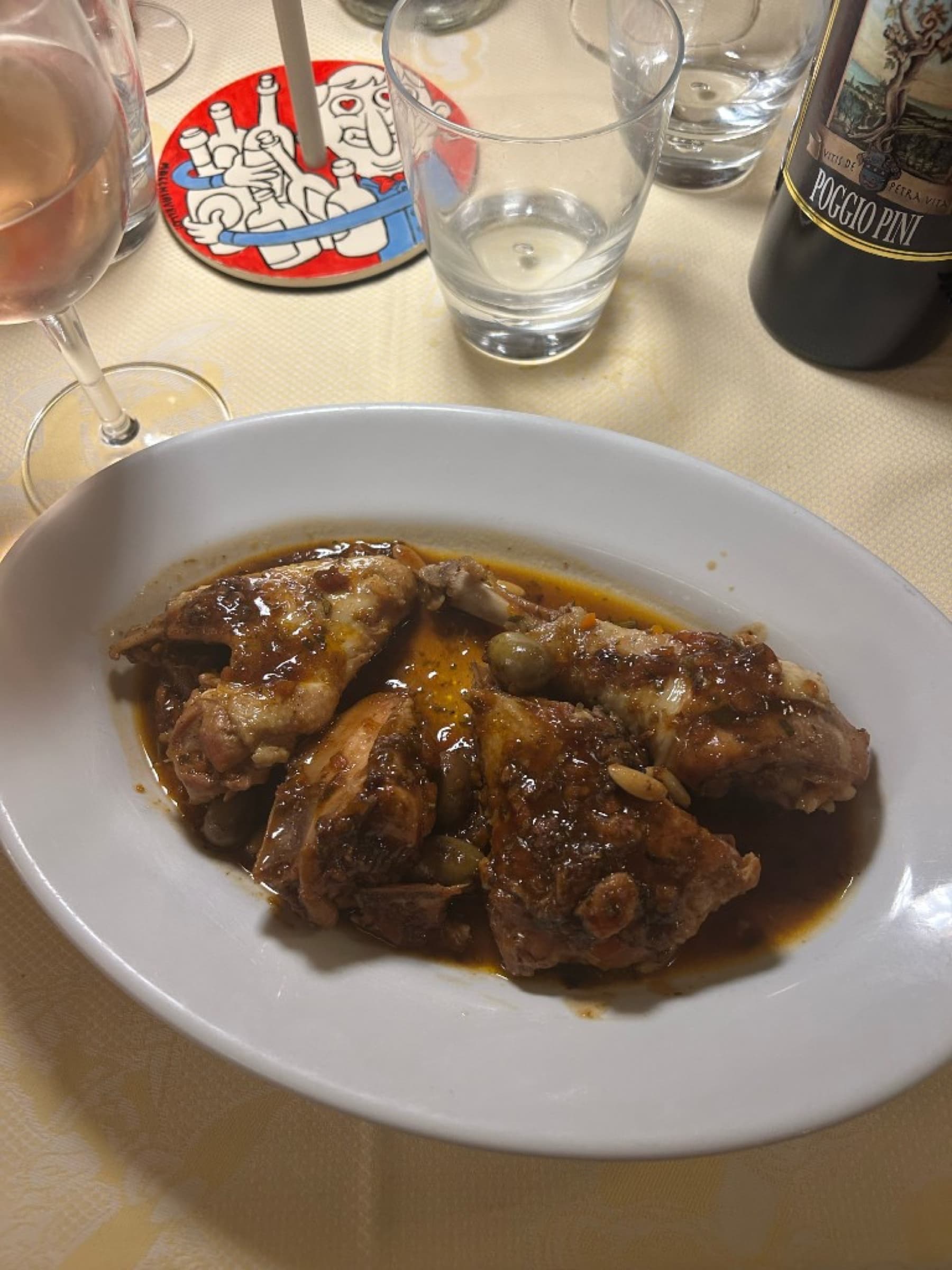 Fall-off-the-bone chicken with olives and pine nuts
