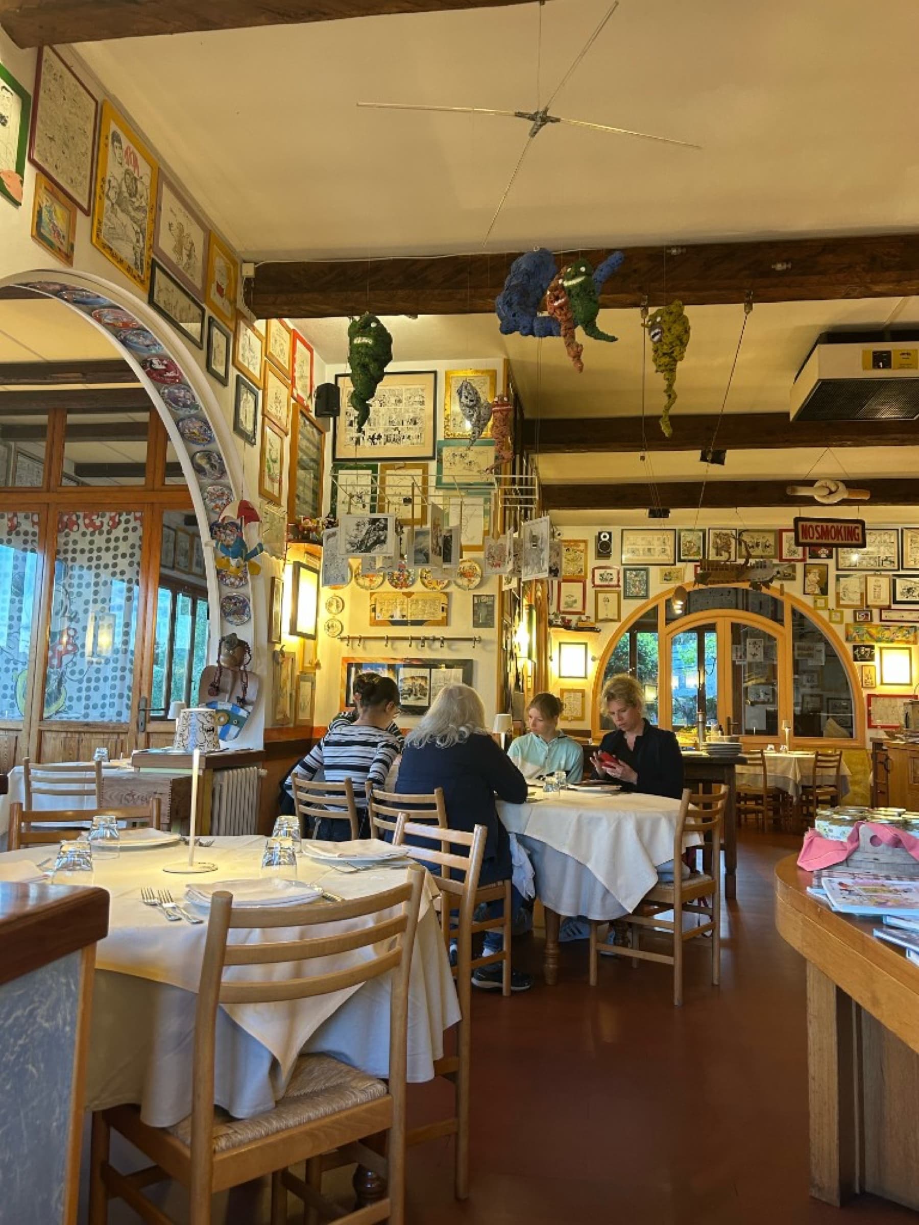Wall-to-wall comic art in the trattoria